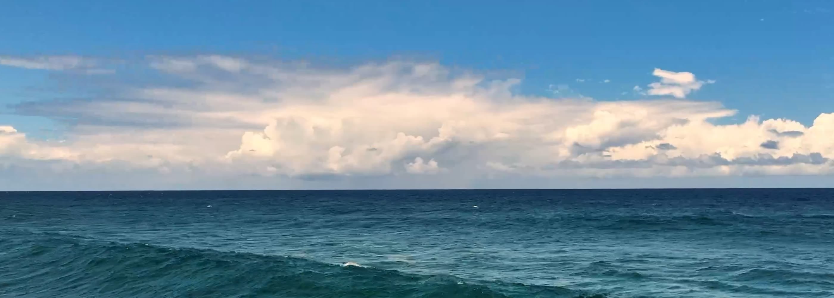Wide open ocean and sky showing the range a Lift eFoil can travel
